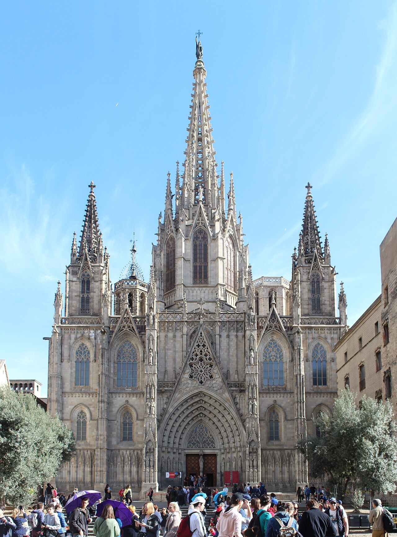 The cathedral façade seen a little wider, its three spires above the main doorway.