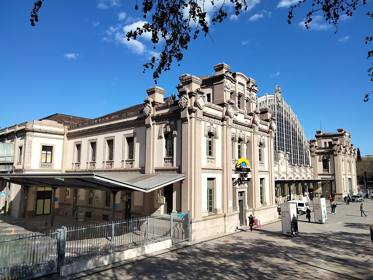 The ornate façade of Estació del Nord, with its iron-and-glass hall beyond.