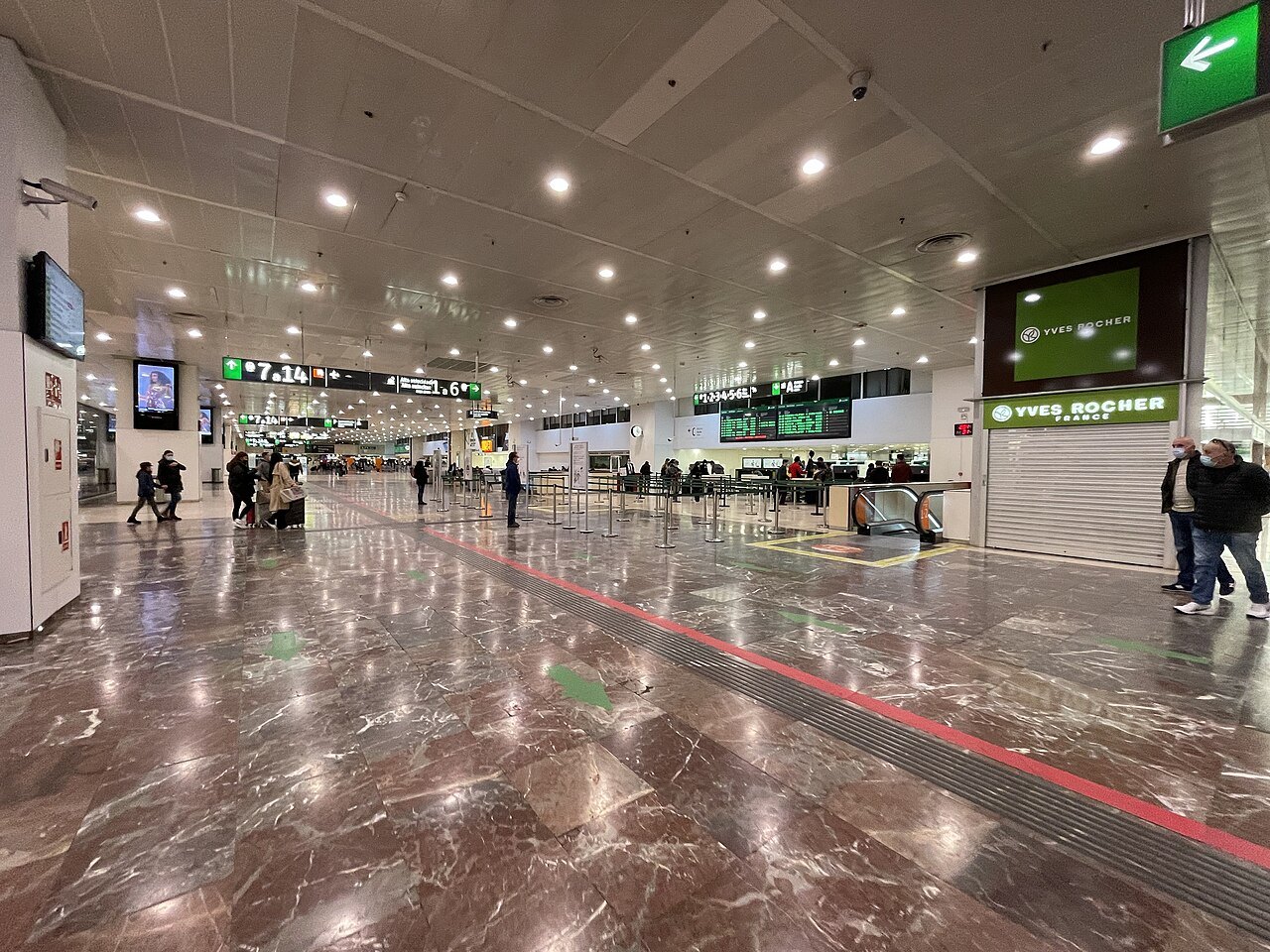 The polished marble concourse at Barcelona Sants.