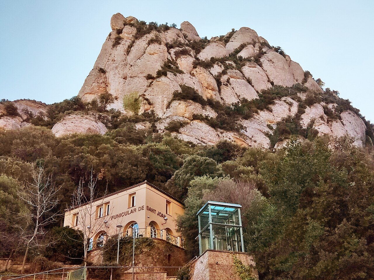 The lower station of the Sant Joan funicular, below the rock walls of Montserrat.