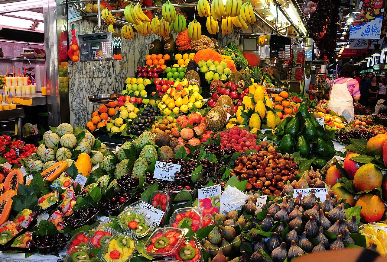 A stall piled high with fruit and vegetables in the Boqueria.