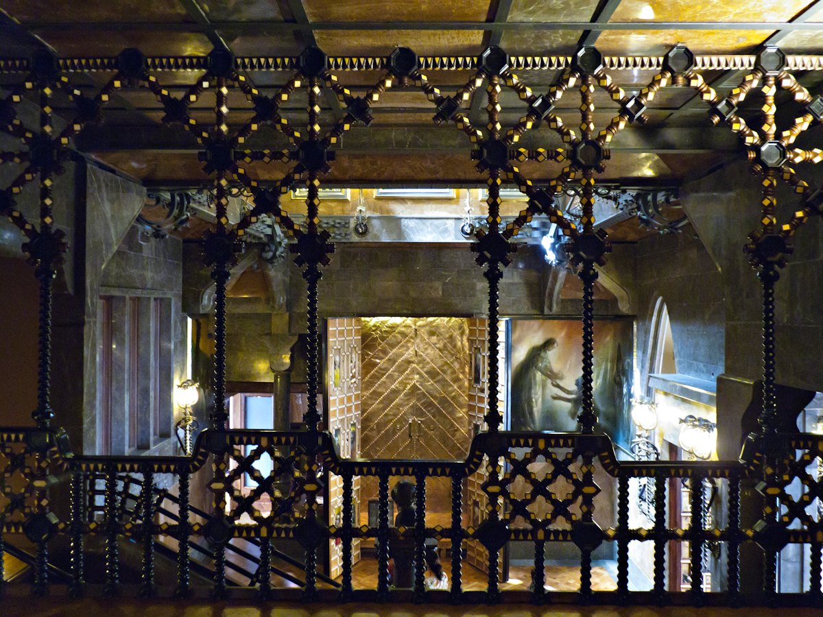 A wrought-iron screen and railing in the Palau Güell.