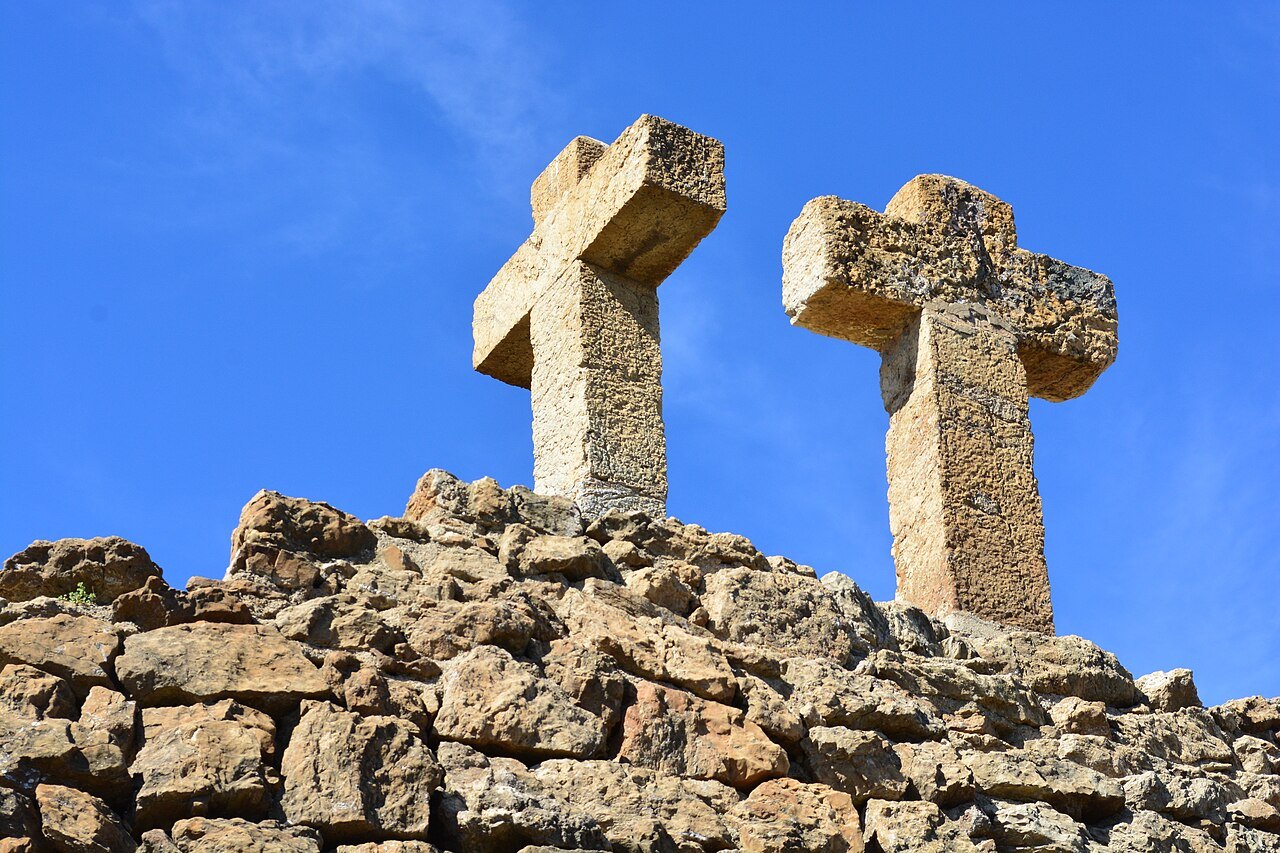 Two stone crosses on the Calvary hill at Park Güell.