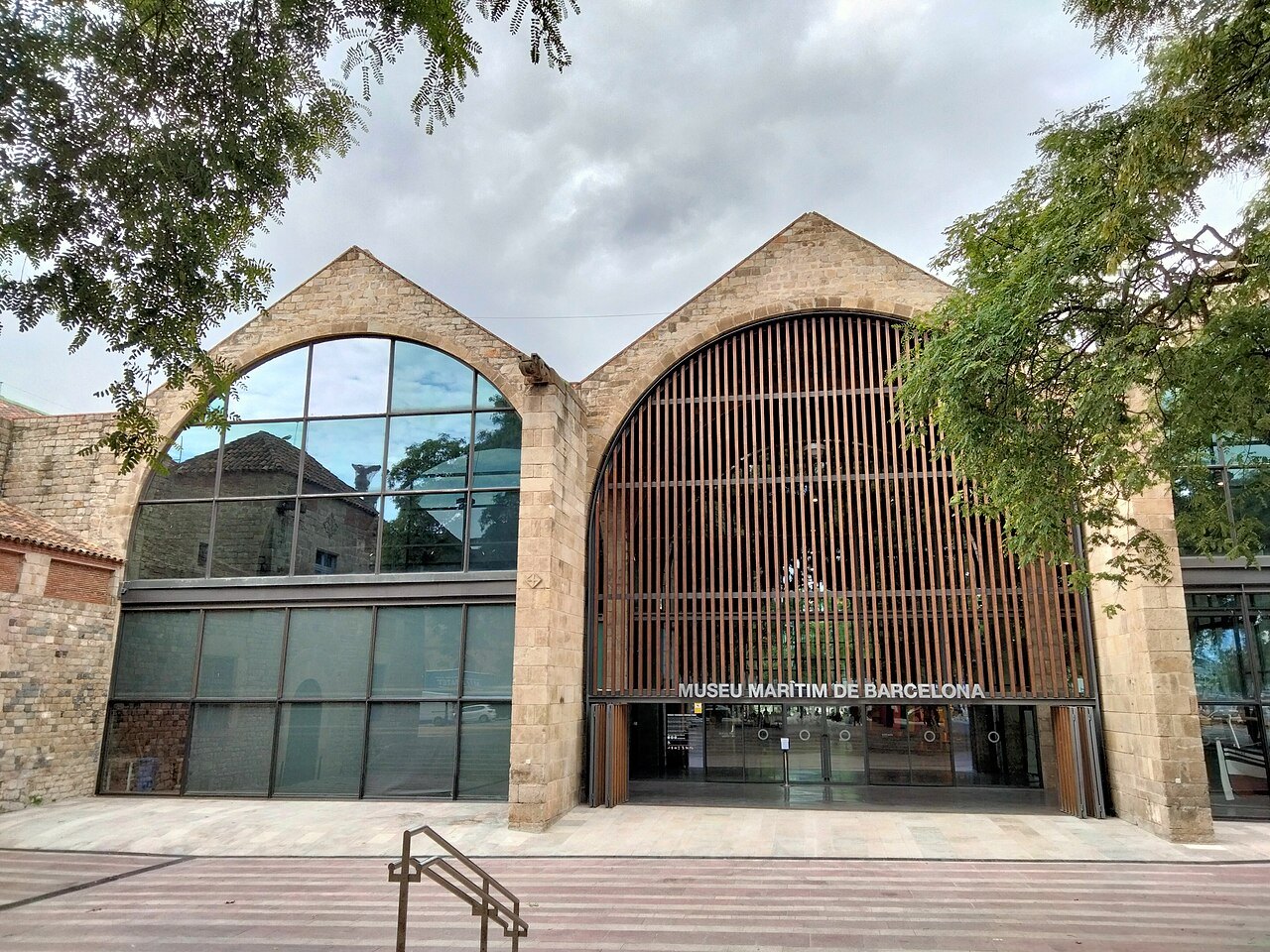 The glazed arches of the old shipyard's entrance, now the Maritime Museum.