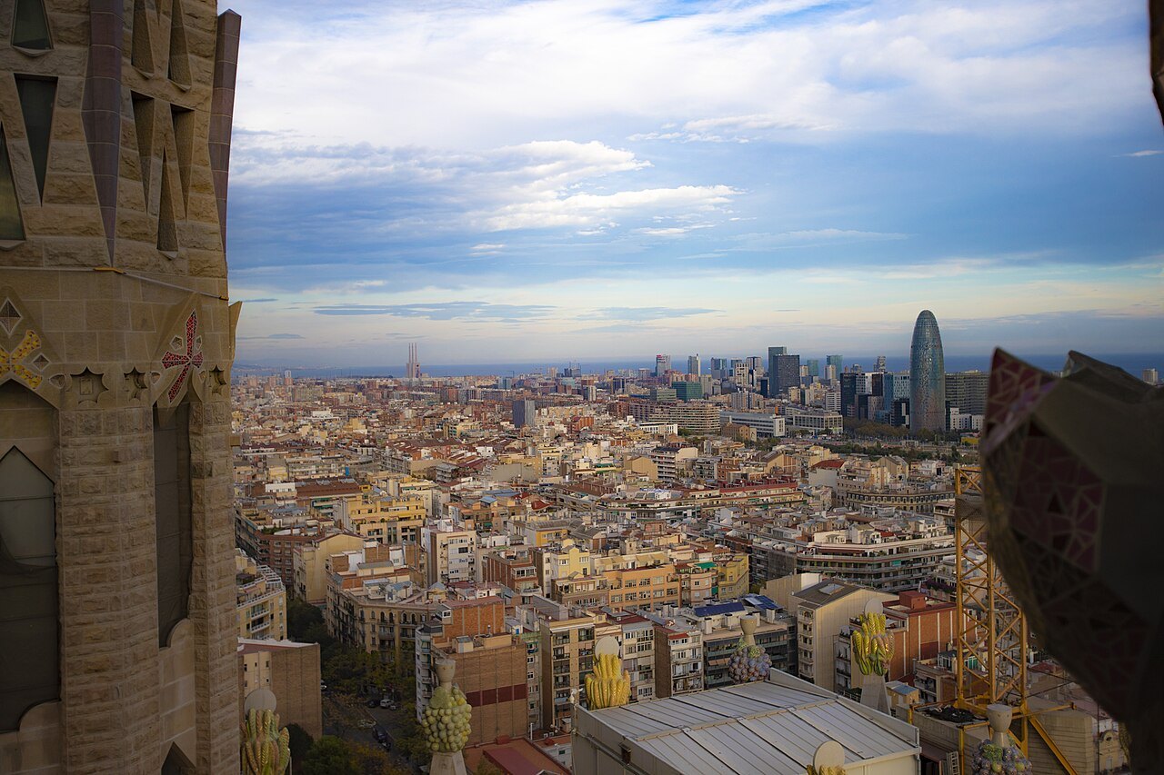 The city seen from a tower of the basilica, with the Torre Glòries on the skyline.