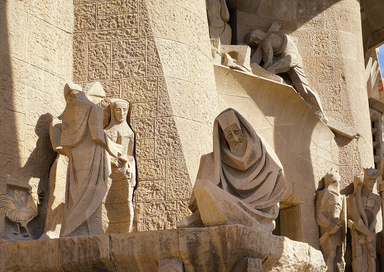 Sculpted figures in angular stone on the Passion façade.