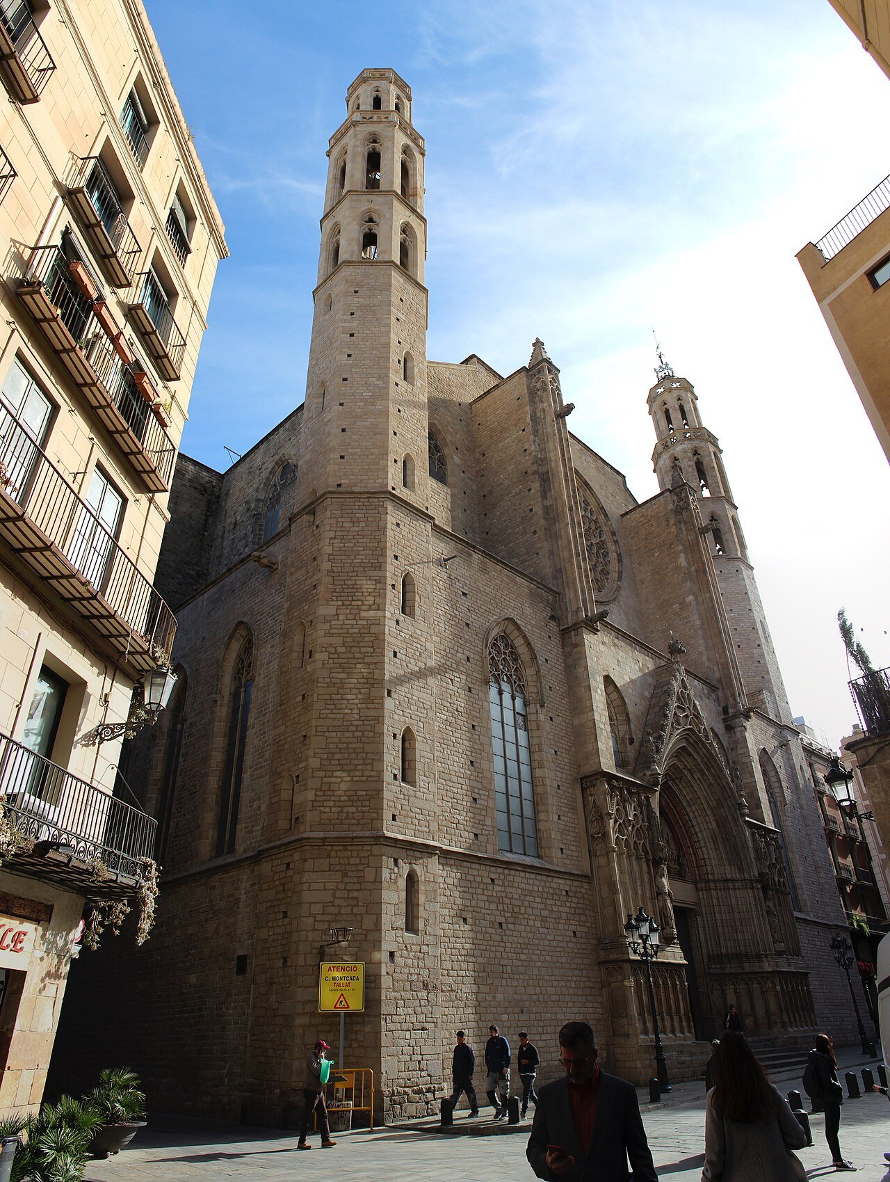 The church and its bell tower seen from a street in the Born.