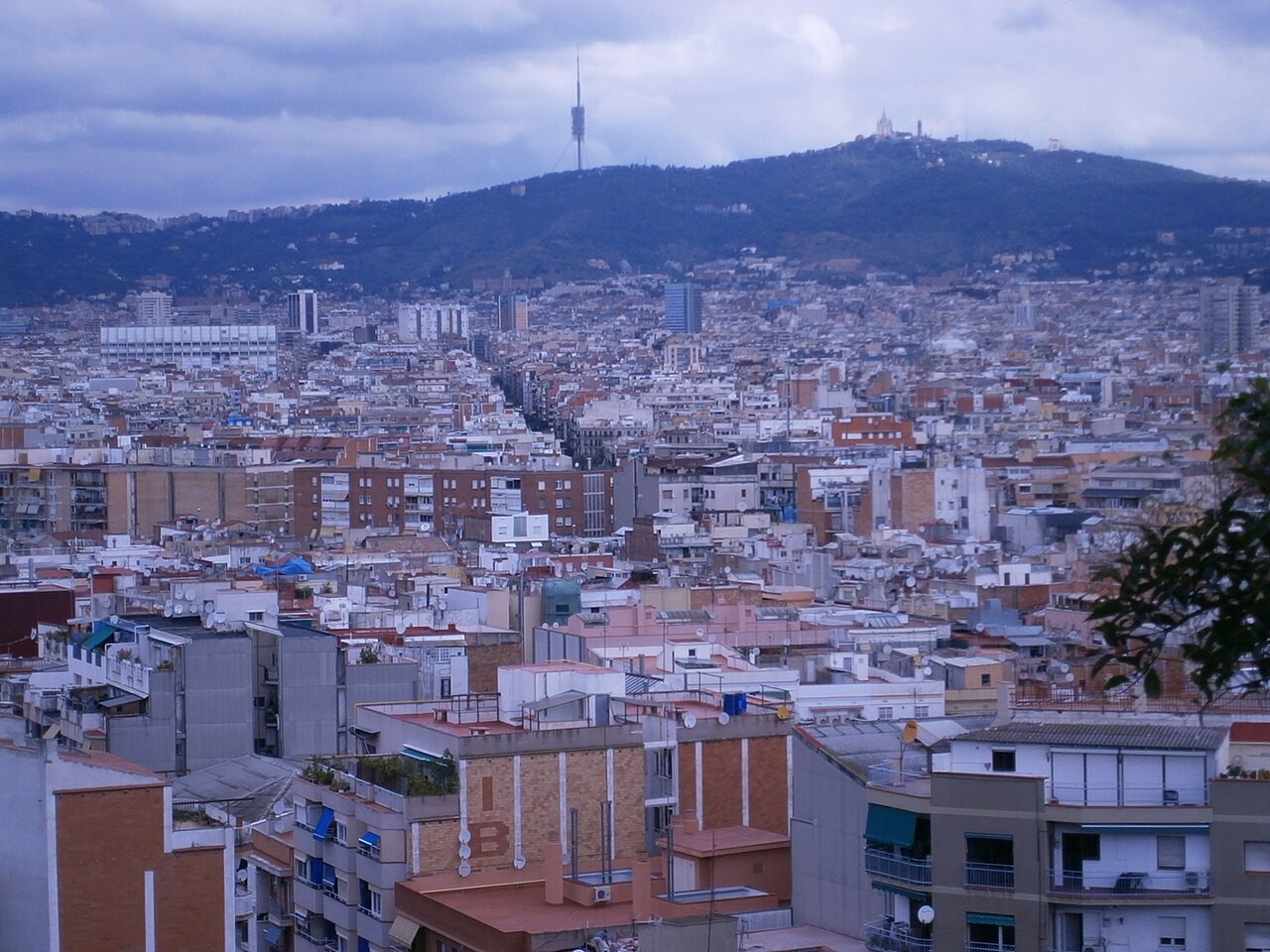 The city grid beneath the Collserola range, seen from above.