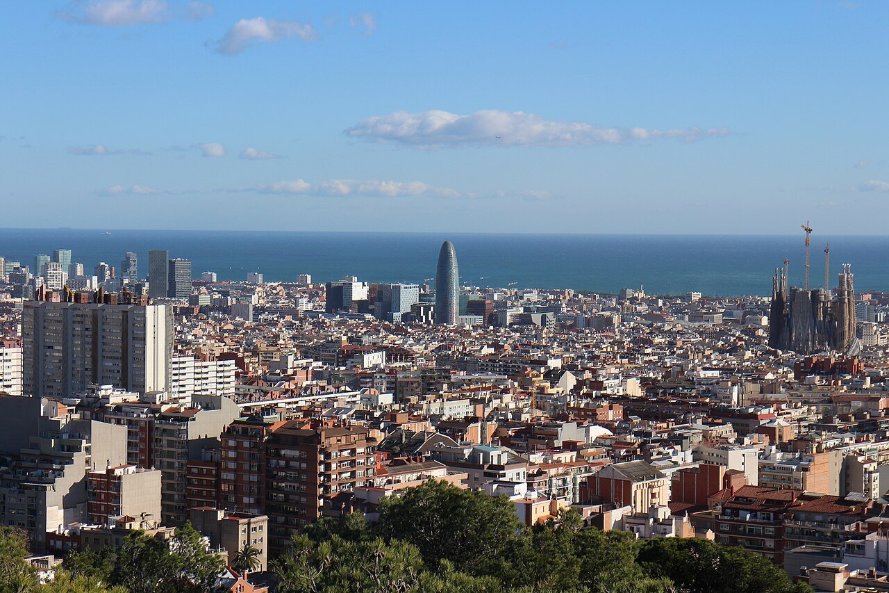 The city seen from Park Güell, with the Torre Glòries and the Sagrada Família on the skyline.